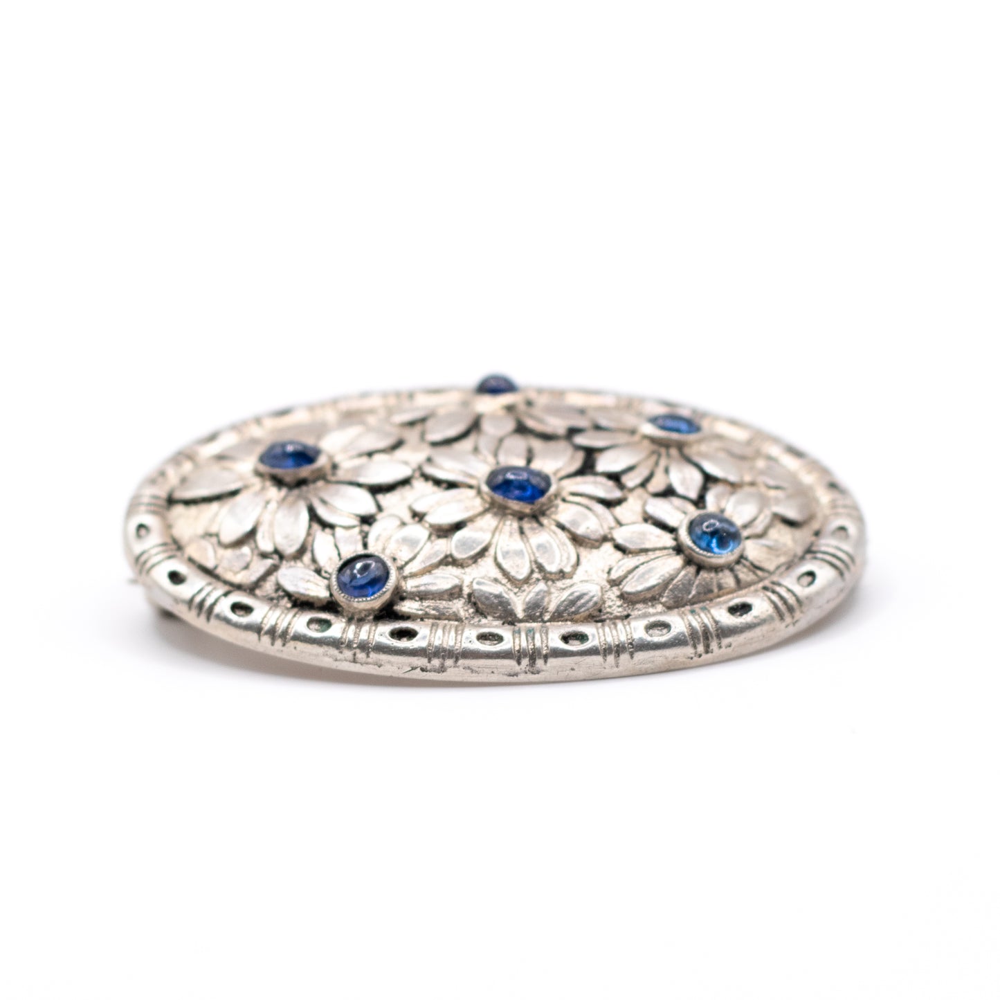 Silver Vintage Brooch With Flower Pattern And Synthetic Sapphire Cabochons