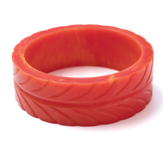 Vintage Salmon-Red Carved Plastic Bangle Bracelet