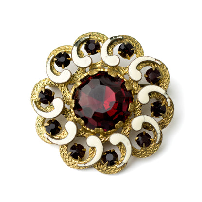 Broche vintage autrichienne ou tchèque avec cristaux de verre rouges et émail blanc