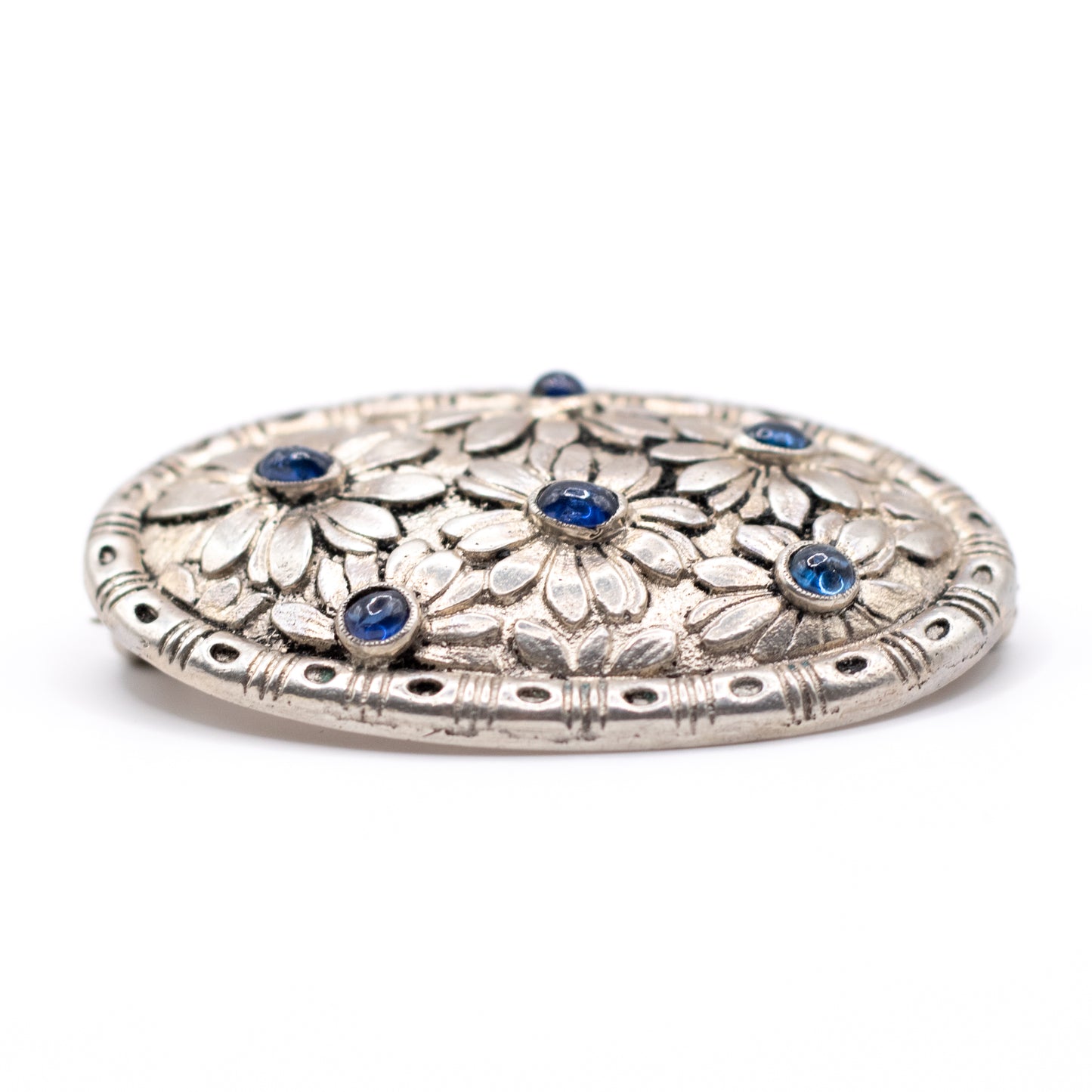 Silver Vintage Brooch With Flower Pattern And Synthetic Sapphire Cabochons