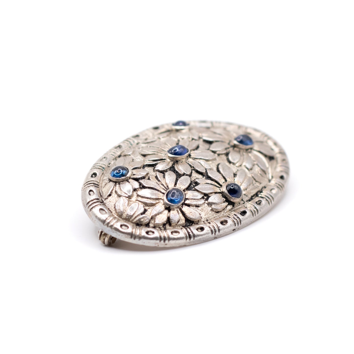 Silver Vintage Brooch With Flower Pattern And Synthetic Sapphire Cabochons