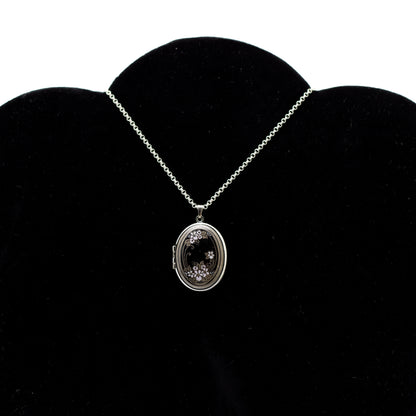 Pendentif médaillon floral en émail noir Michaela Frey, bijoux autrichiens vintage